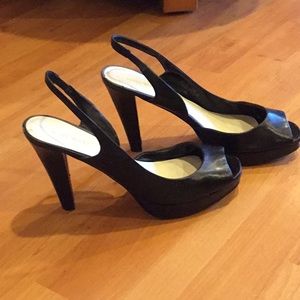 Black leather platform peep toe sling backs